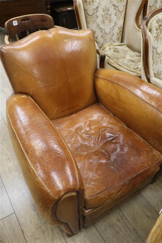 A 1940s French tan leather club armchair, W. approx. 89cm H.78cm L.96cm